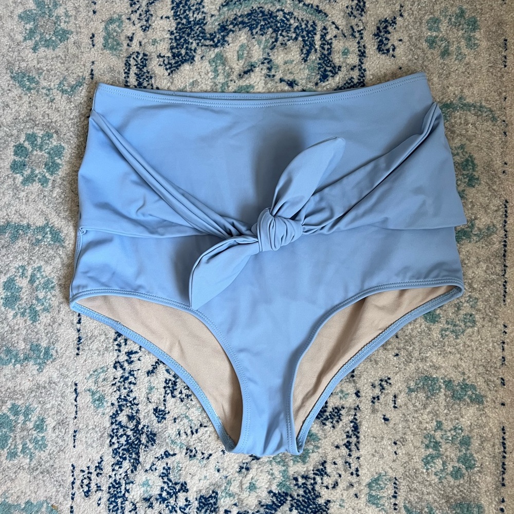 Kortni Jeane bottoms. Light/powdered blue color. High waisted w/ knot bow. NWOT